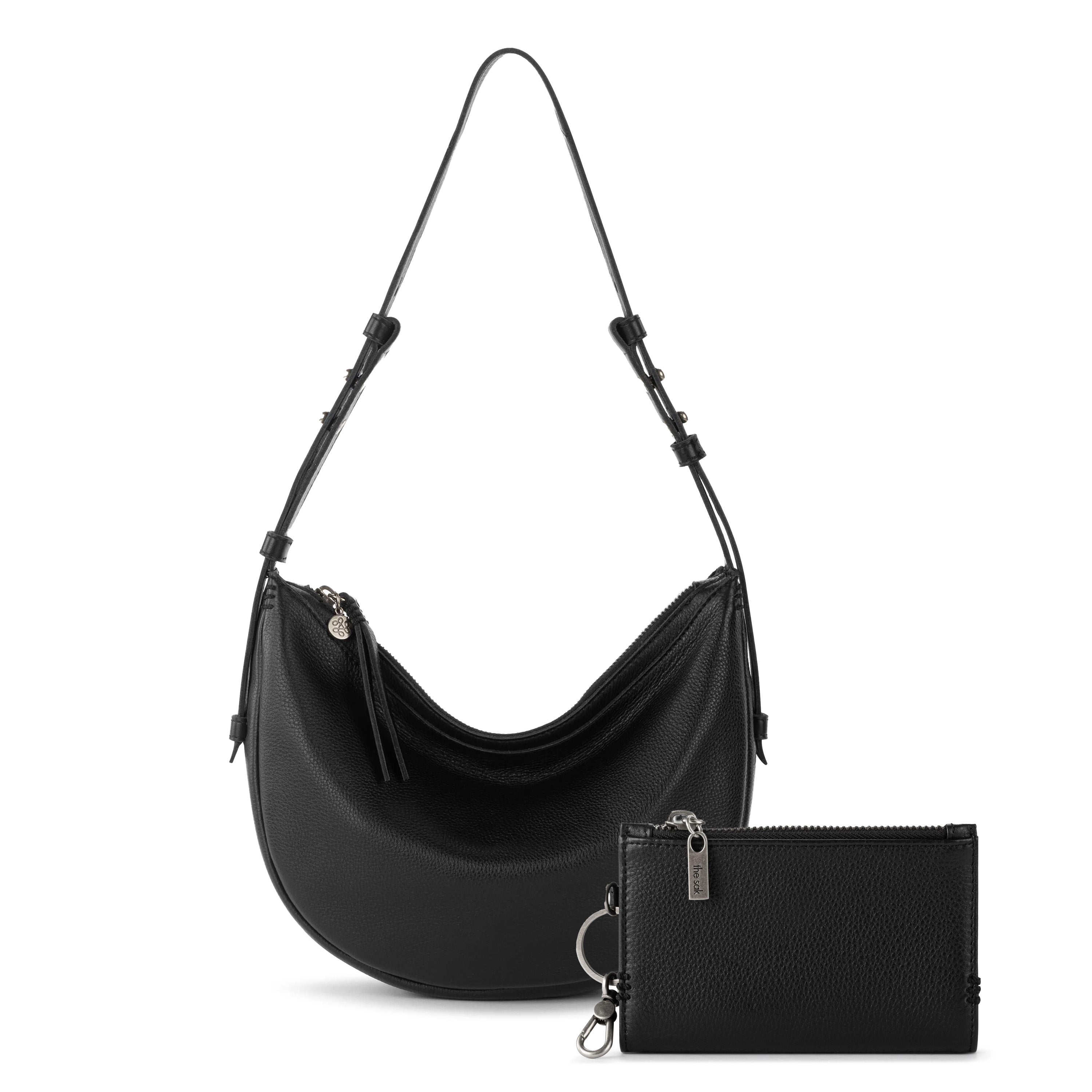 Black pebbled leather shoulder bag with adjustable straps and matching zip wallet with key clip.